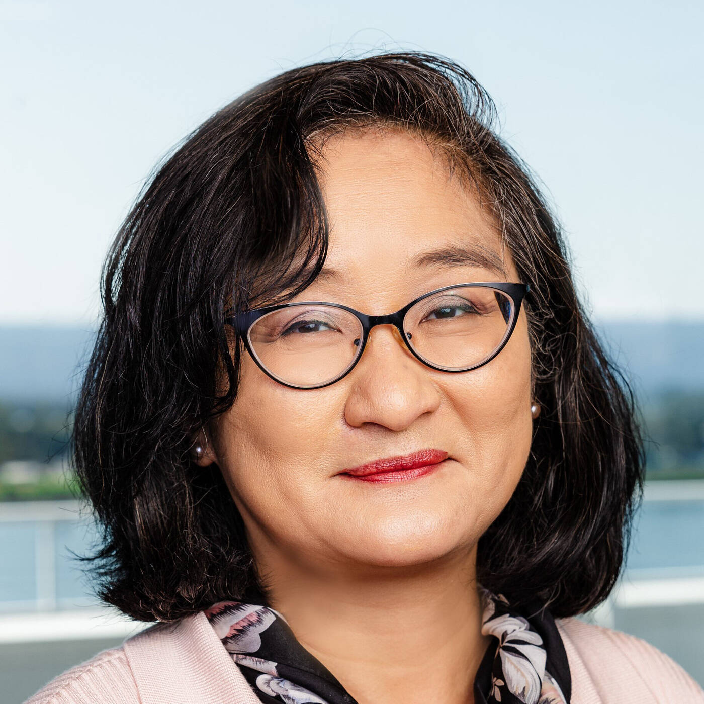 Professional headshot of Pauline Fong, Chief Impact & Program Officer