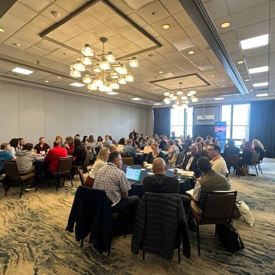 Nonprofit leaders seated at tables at an Oregon nonprofit conference during a Murdock Trust Listening Session